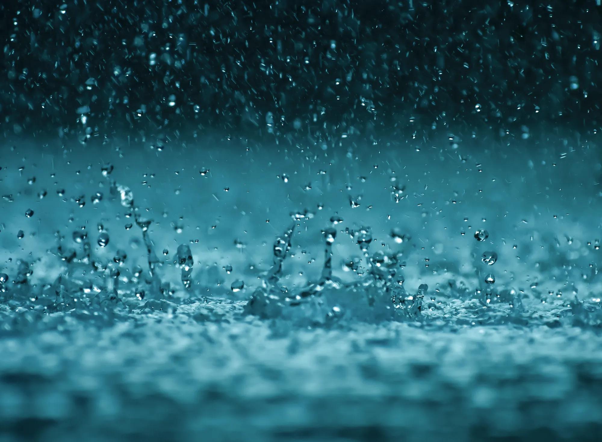 Rain water drop falling to the floor in heavy rain day