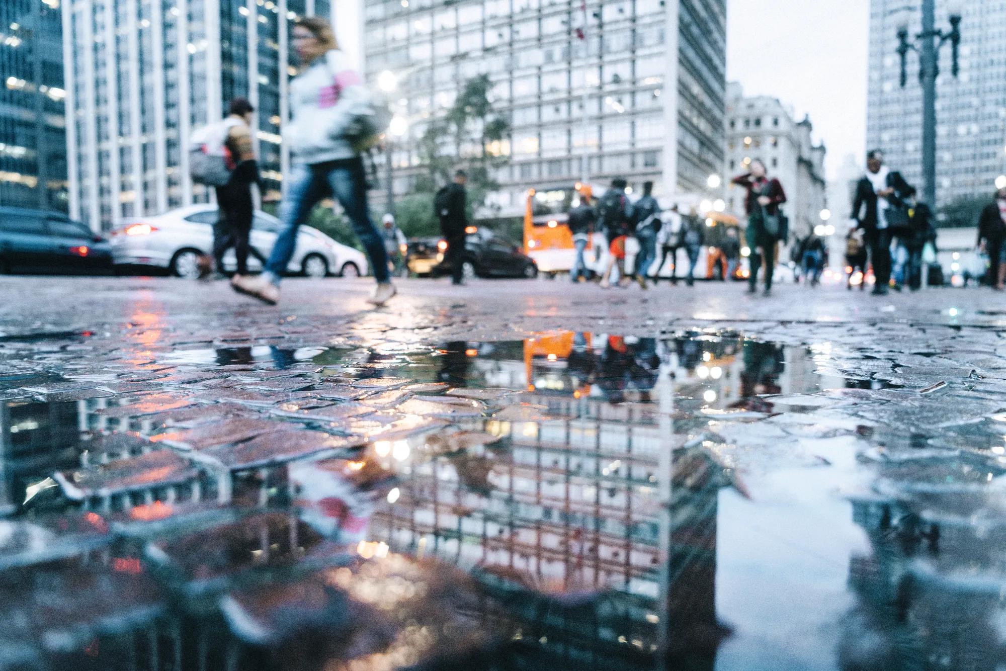 Puddle reflection view to the streets of downtown  São Paulo, Brazil