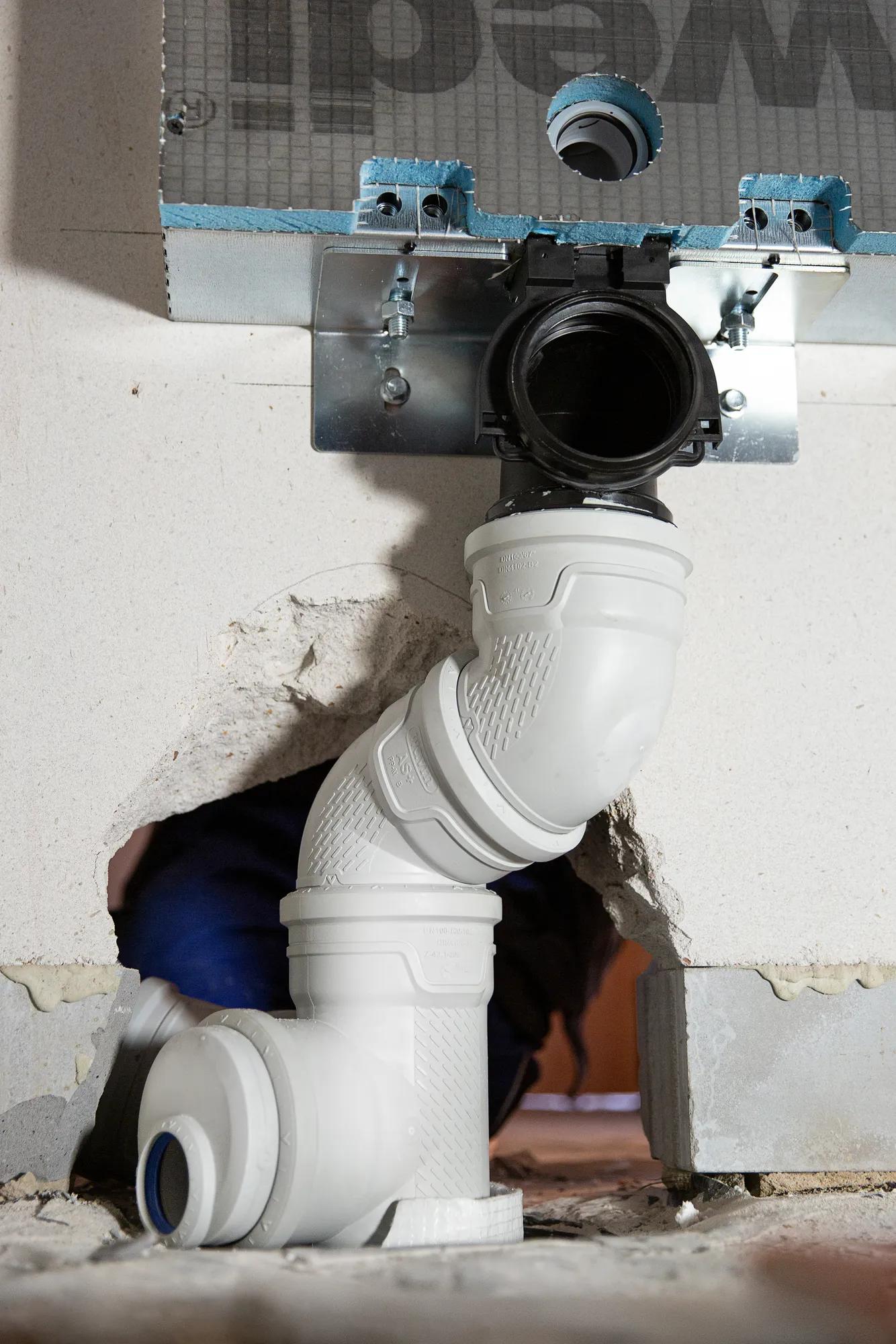 AS+ installed in a house with the plumbers and close up product images