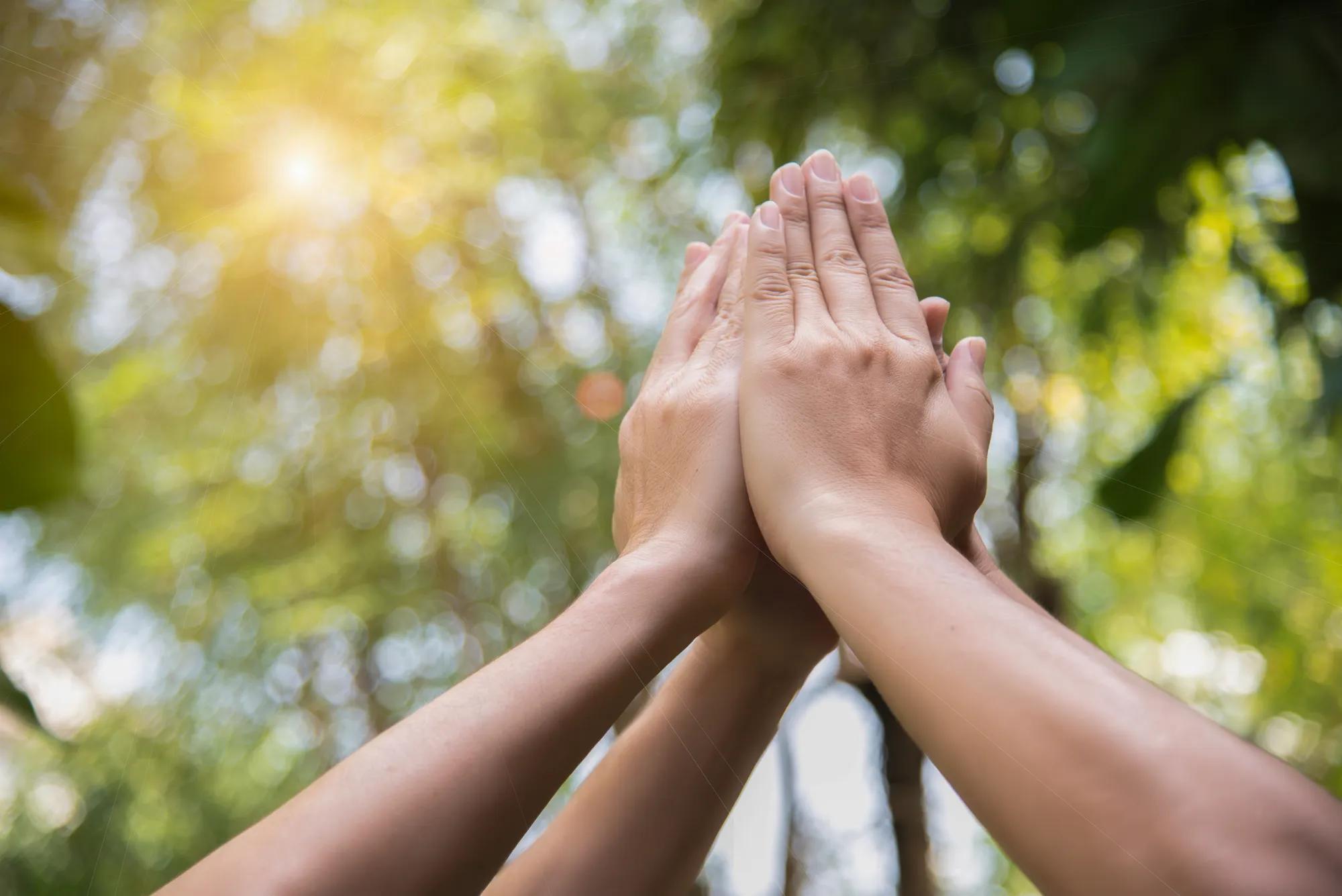 People join hands together for cooperation  more power to teamwork,partnership and collaboration 
to drive business goal achievement,copy space,selective focus. AdobeStock_506807842