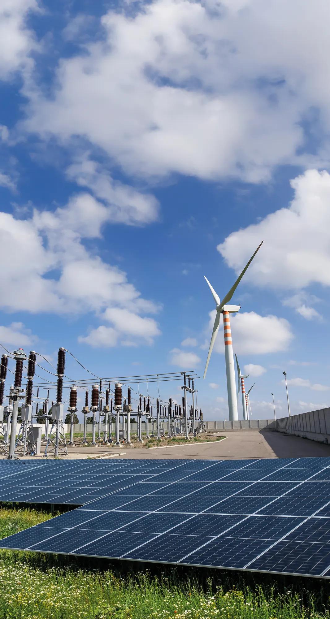"The electricity equipments of transformer station with wind generators background, Sardinia (Italy)"