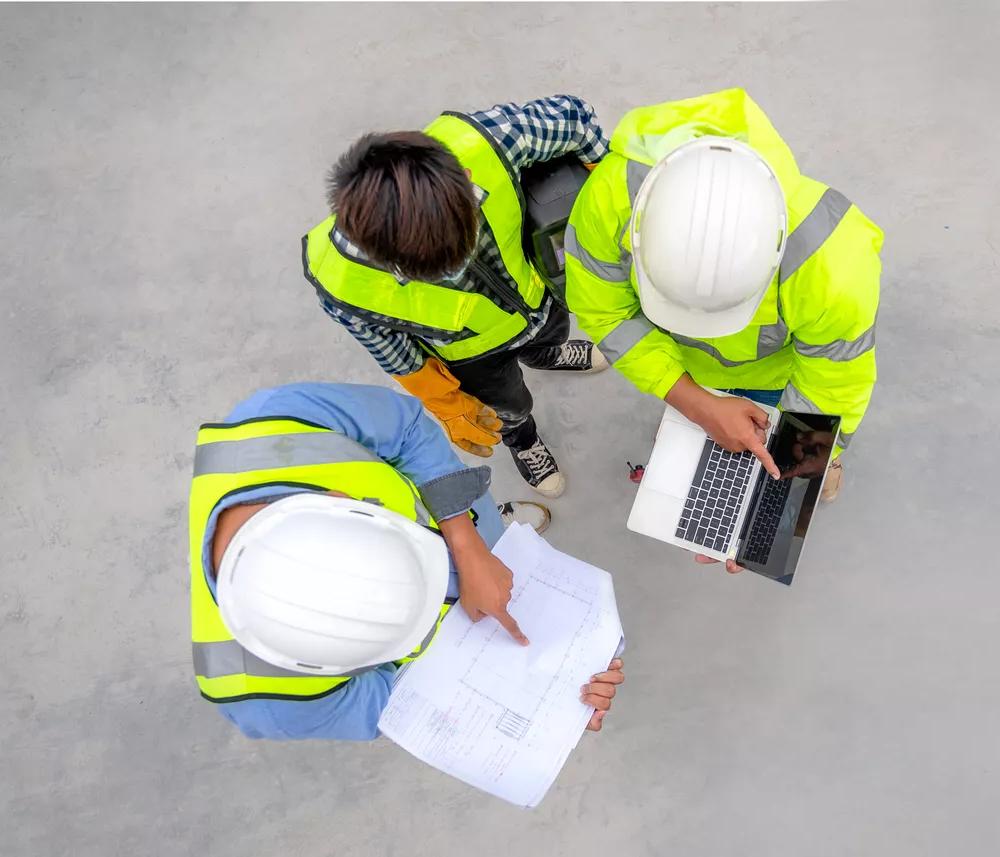 Banner : Civil engineer inspect structure at construction site against blueprint, Building inspector join inspect building structure with civil engineer. Civil engineer hold blueprint inspect building